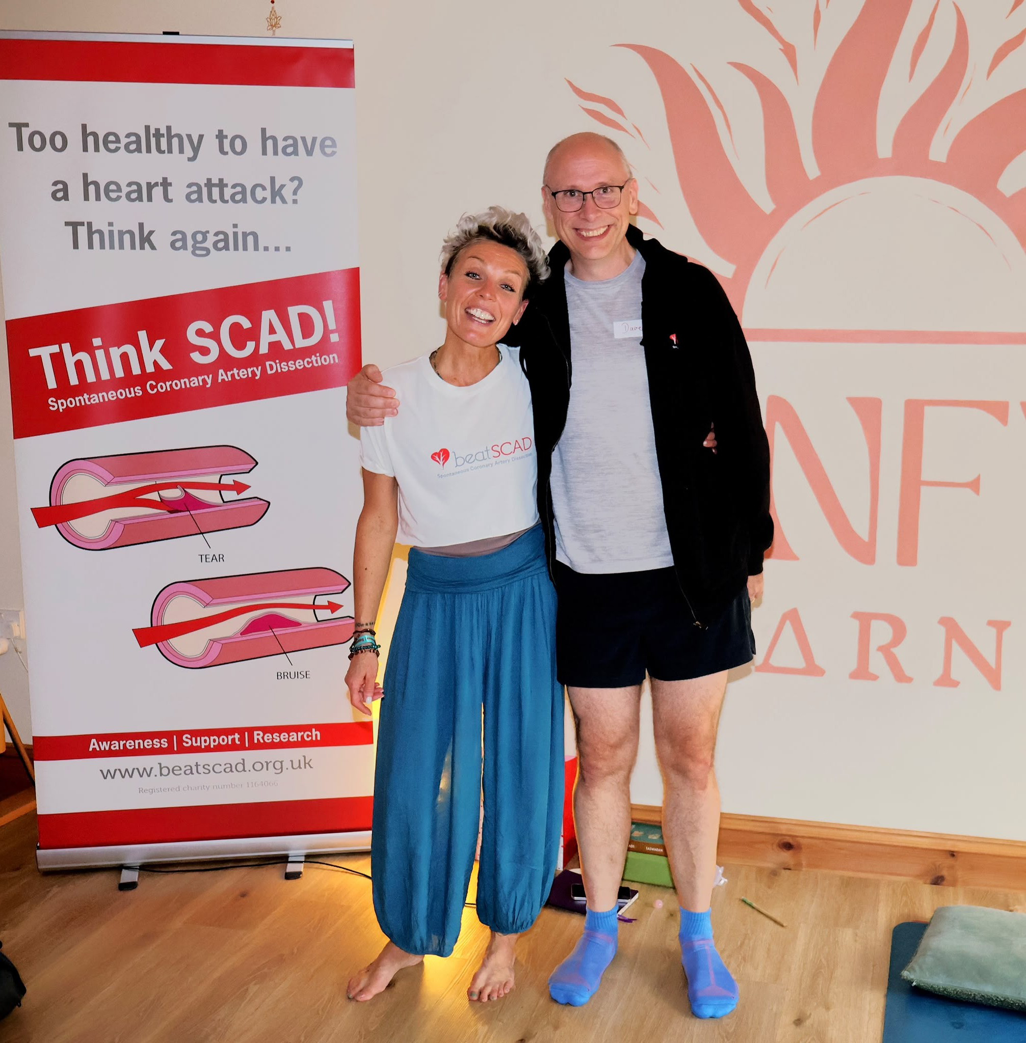 Dr David Adlam and Rowena at yoga fundraising event